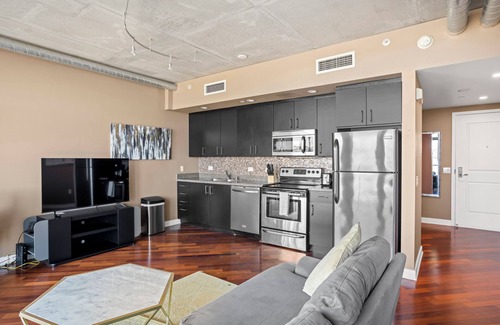 Civic Core Condo | Elegant 1 Bedroom in a Prime Location Free Parking & Wifi!