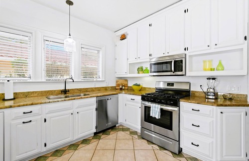 Lake Park House | Elegant 1926 Mediterranean Home Heated Pool/Spa Sleeps 12