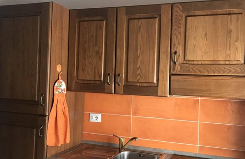 Castagneto Carducci Apartment | Elegant apartment in the historic village, with ceiling beams and splendid views
