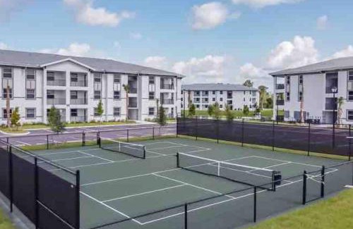 Eastwood Village Apartment | Elegant Pool & Hot Tub with Palm Trees #201