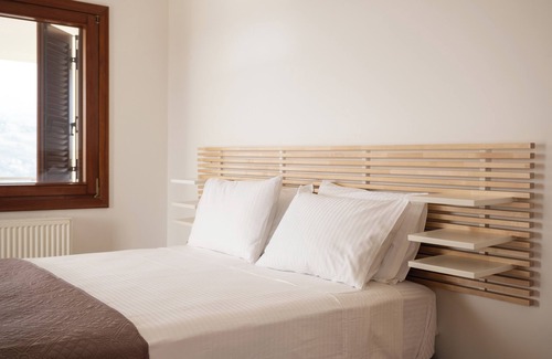 Pitharion House | Elegant pool villa close to Chania with amazing mountain and bay view.