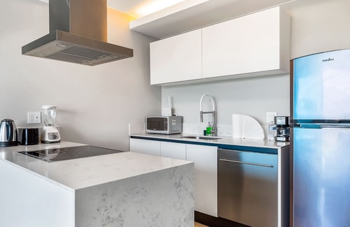 Flamingos Condo | Elegant resort condo with fantastic views, private balcony, and a great location