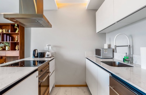 Flamingos Condo | Elegant resort condo with fantastic views, private balcony, and a great location