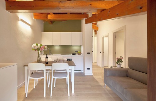 Riva del Garda Apartment | Elegant Top Floor Apartment "Salvia" with Mountain View & Balcony