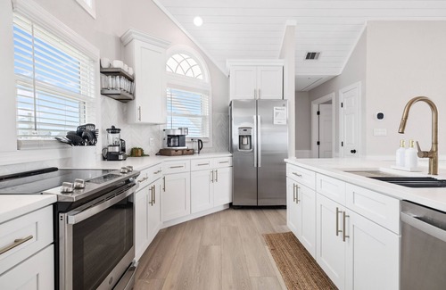 Waves House | Elegant Updated Oceanfront Home w/Pool & Hot Tub - Fast WIFI & Dog Friendly!