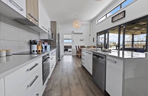 Newlands Arm House | Elevation: A stunning modern holiday home with a fantastic entertaining deck