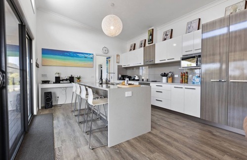 Newlands Arm House | Elevation: A stunning modern holiday home with a fantastic entertaining deck