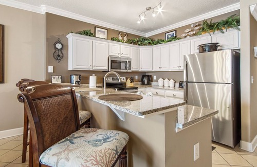 West Panama City Beach Condo | Emerald Isle 2206 - Front row beach chairs included! Assigned parking!