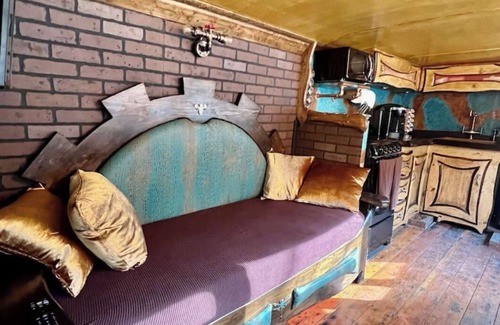 Hayesville House | Enchanted MidKnight Bus with Loft, Firepit, Petting Zoo & Wizarding Adventure