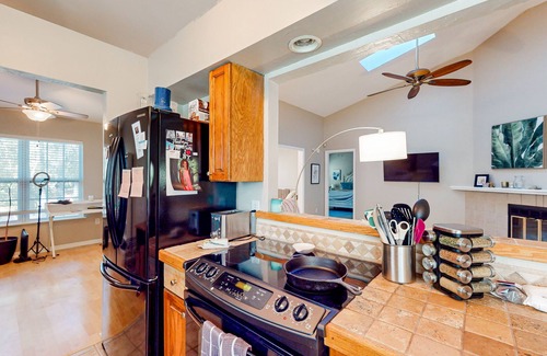 Haile Plantation House | Enchanting dog-friendly home with fenced yard - near trails