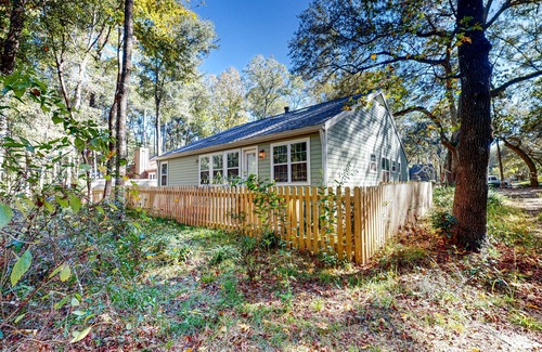 Haile Plantation House | Enchanting dog-friendly home with fenced yard - near trails