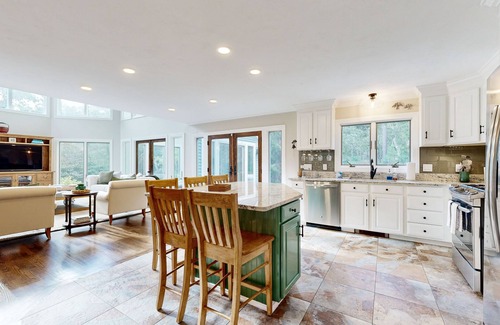 Lagoon Heights House | Enchanting home with tennis, firepit, golf nearby & washer/dryer
