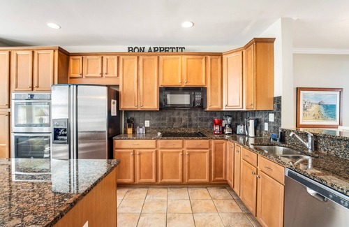 Sunset Island House | End townhome w/partial bay view - steps to resort pools, beach & clubhouse