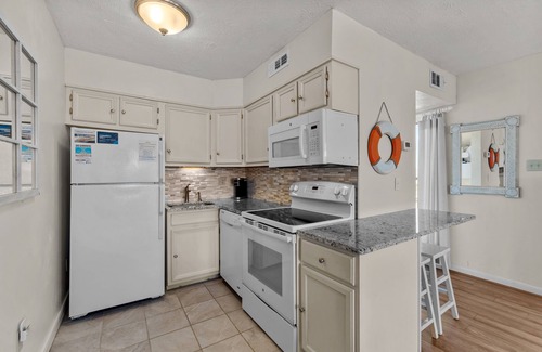 Duck Condo | End unit with wonderful ocean views!