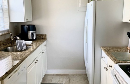 Anna Maria Condo | Endless Summer- On Pine Ave, steps to beach & pier w/water view & dock