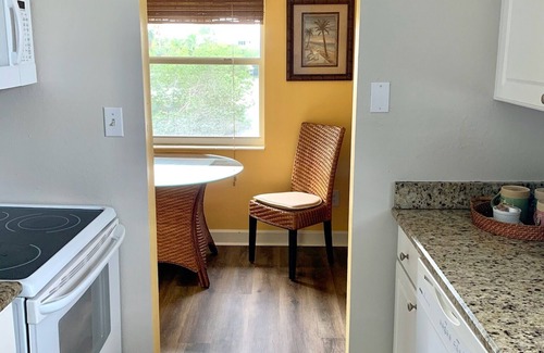 Anna Maria Condo | Endless Summer- On Pine Ave, steps to beach & pier w/water view & dock
