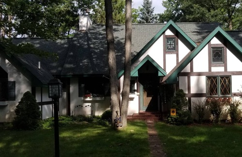 Higgins Lake House | English Cottage Lakefront House with Beautiful Sunsets