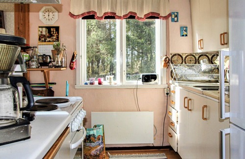 Hastveda House | Enjoy a beautiful view of the countryside in this authentic vacation home.