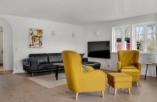 Dannemare House | Enjoy a carefree time with the family in this comfortable vacation home with wellness.