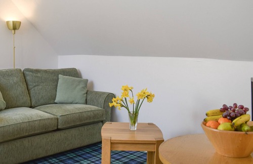 Killin Cottage | Enjoy a relaxing stay at Pine Cottage, a first floor apartment where you can participate in a game o