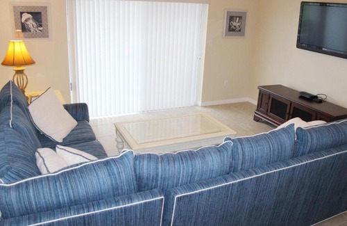 New Smyrna Beach Apartment | Enjoy breath taking sunsets in this 32 located right off the estuary OW10-403