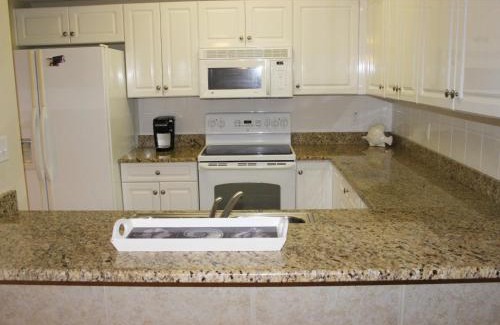 New Smyrna Beach Apartment | Enjoy breath taking sunsets in this 32 located right off the estuary OW10-403