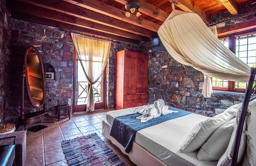 Milatos House | Enjoy breathtaking sea views from the balconies and terraces of this beautiful vacation home set ami