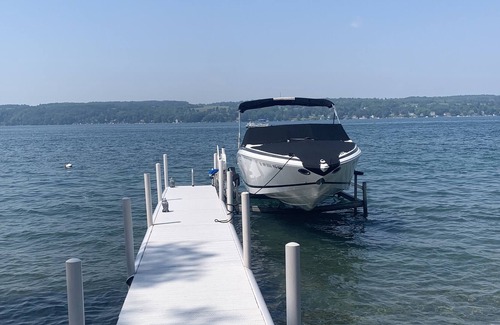 Skaneateles House | Enjoy east side sunsets in elegant, lakeside home with boathouse
