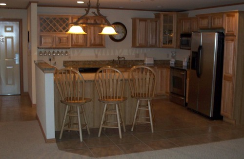 Arkdale Condo | Enjoy lower Rates Your Time At Northern Bay Sunset Condominiums Magnolia Loft.