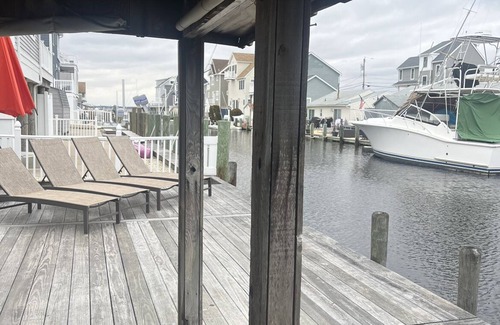 Dover Beaches North House | Enjoy peace & serenity on the water as the sun sets in our beauty on the bay