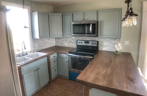 Port St. Joe Cottage | Enjoy sunrise and sunsets on the huge deck and covered bar!