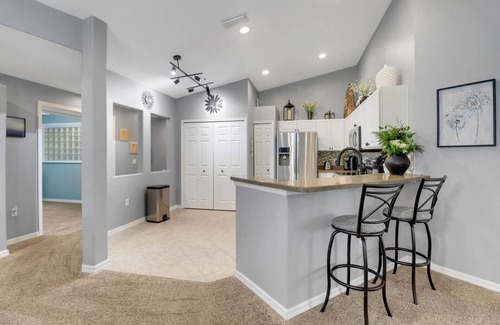 Fort Myers Condo | Enjoy the Colonial Country Club Lifestyle! Beautiful 2nd Floor Condo, Bikes & Tranquil Water Views!