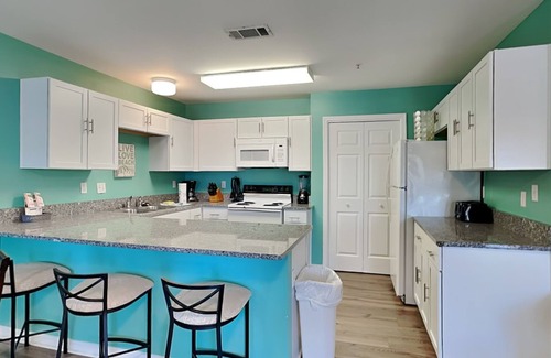 Ono Island Condo | Enjoy the Fresh Sea Breeze from Your Covered Balcony - Easy Walk to the Beach!