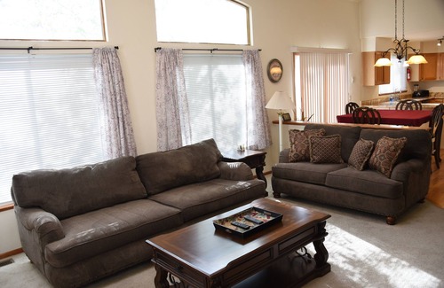 Northeast Colorado Springs House | Enjoy the large patio and shaded back yard of this large home with 2 kitchens