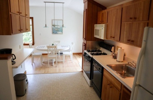 Brewster House | Enjoy this 1,600 sqft two story guest house with A/C, garage, balcony, and access to bike trail!