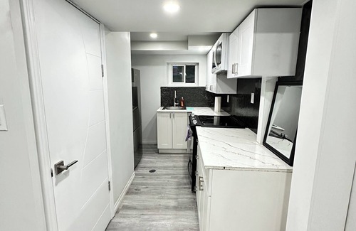 Kitchener House | Entire 2 Bedroom lower Unit, Kitchen+Wi-Fi+Laundry+Parking+Ventilated+Well Lit