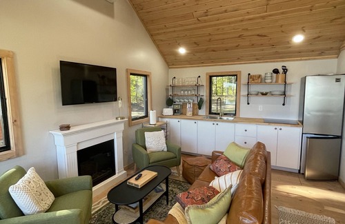 South Boardman Cabin | Escape to Serenity: Private Lake and Cozy Cabins for Rent