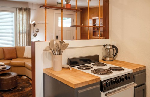 Phoenix House | Escape to this artsy 2-bedroom MCM Guesthouse in charming Phoenix, OR. Unwind in the luxurious spa soaking tub after exploring Southern Oregon. Features high-end design for a stylish, quiet retreat.