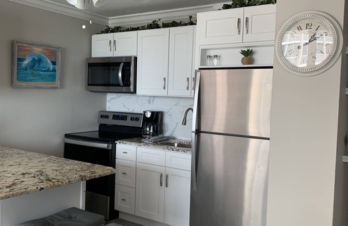 South Island Condo | Estero Beach & Tennis Club by Check In Vacation Rentals