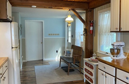 Bear Lake House | Every season home. Snow to summer's glow. A lakeside delight. Feels just right.