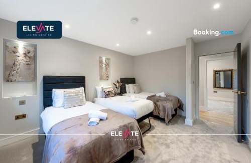 Barnhill Apartment | EXCLUSIVE DEALS l LAST-MINUTE ESCAPE l 1 X SUPER KING BED AND 3 SINGLE BEDS l WEMBLEY STADIUM LOCATION, FREE PARKING, SLEEPS 8 l Elevate Living Estates Short Lets & Serviced Apartments Wembley