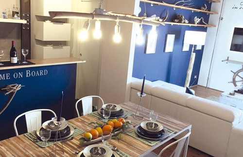 Santa Lucia Apartment | Exclusive nautical-style apartment overlooking the port of Ortigia