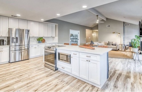 Raisin House | Executive Rental, open floor plan, 3 bdr, 2 bath, office and pool.