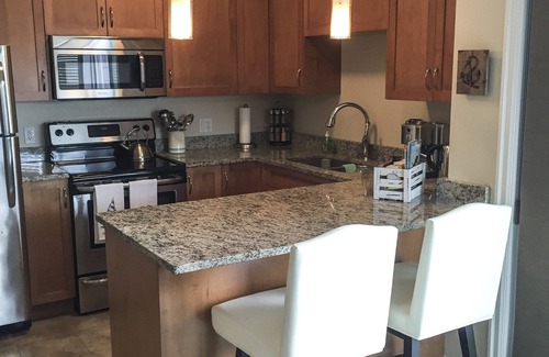 Booktown Condo | Executive suite beautifully furnished & equipped accepting 90 day Bookings.