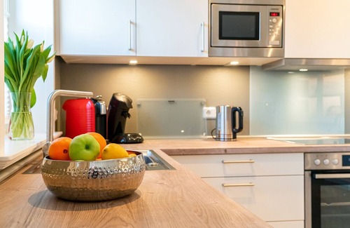 Greetsiel House | Exklusives Friesenhaus "hus in Lee" mit Sauna und Eingezäuntem Gartenbereich