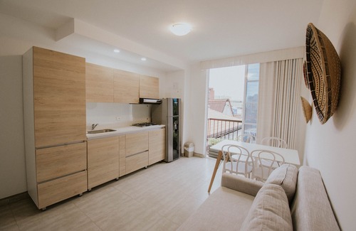 Cali Apartment | Exotic getaway with this brand new apartment with city and pool view
