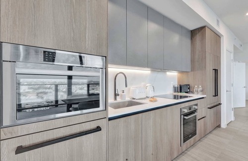 North Beach Condo | Expansive 4-Bedroom Condo Steps from the Beach with Stunning Views