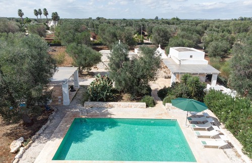 San Michele Salentino House | Experience Timeless Elegance: 1600s Trullo with Private Pool Awaits Your Stay