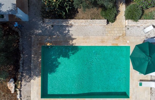 San Michele Salentino House | Experience Timeless Elegance: 1600s Trullo with Private Pool Awaits Your Stay