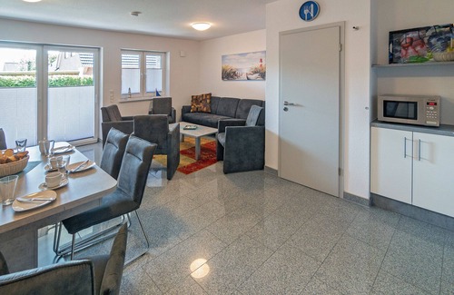 Bensersiel House | Experience an unforgettable vacation by the North Sea in the spacious Domingo vacation home in Bensersiel! This spacious North Sea Oasis house offers around 120 m² of living space and is the ideal retreat for up to 10 people plus a small child. With.
